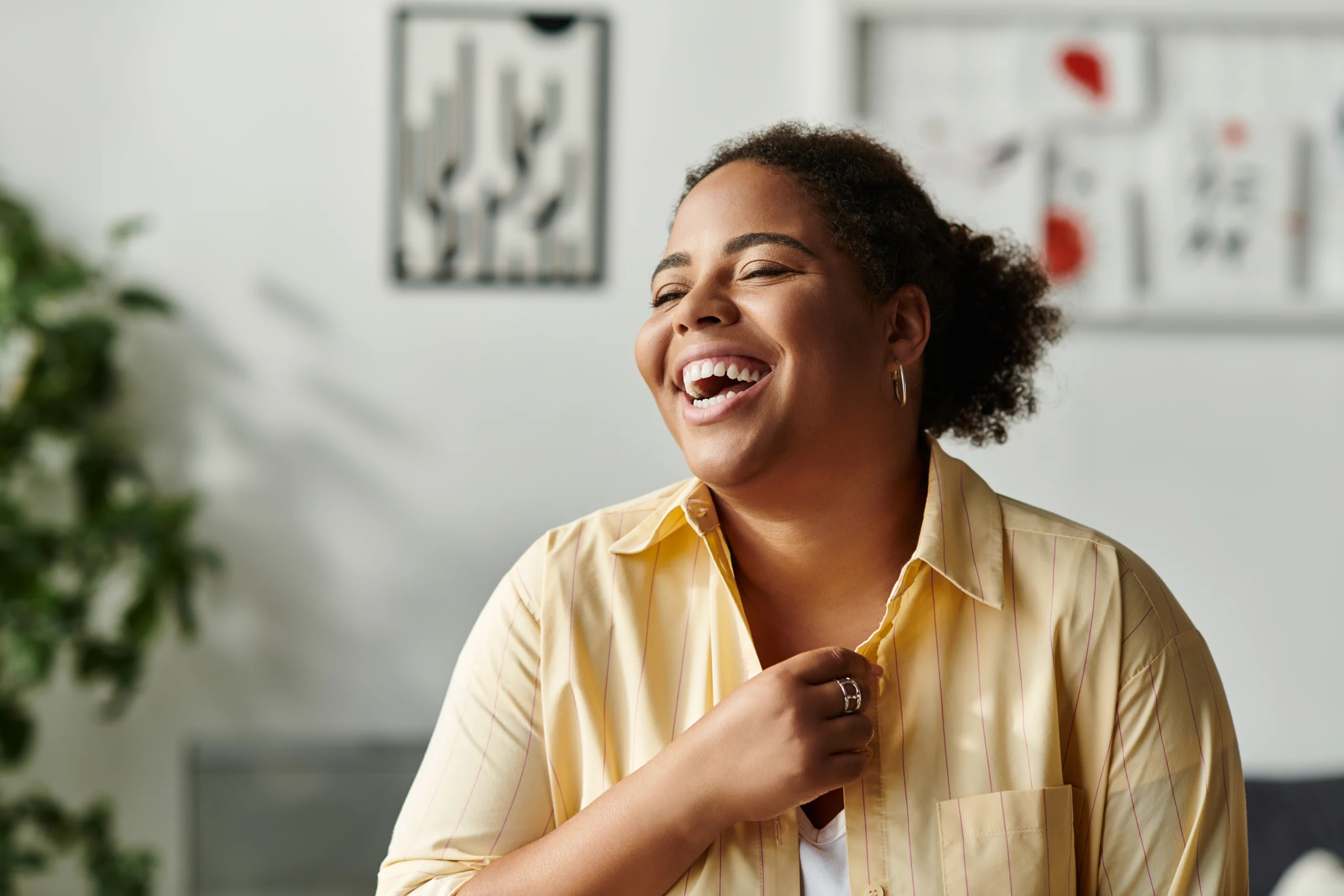 A patient smiling with healthy teeth after a check-up at Primadent, Liverpool