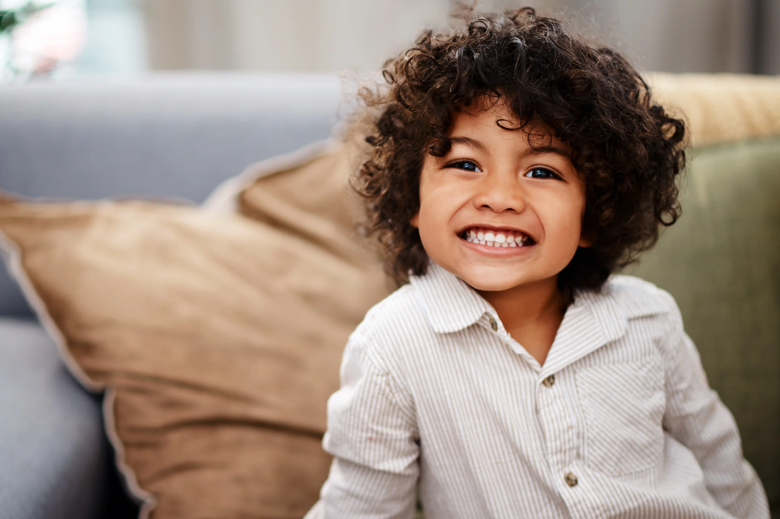 A child enjoying their first dental visit at Primadent, Liverpool